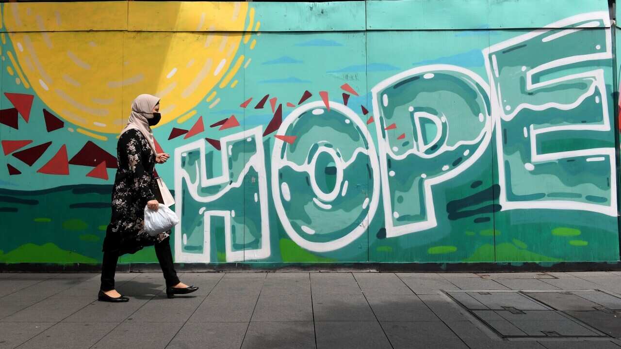 A person wearing a face mask in Liverpool, Sydney
