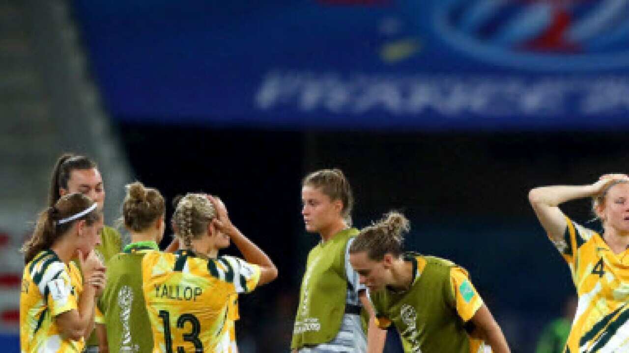 The Matildas look dejected following their defeat in the penalty shootout to Norway at the FIFA Women's World Cup (Getty Images)