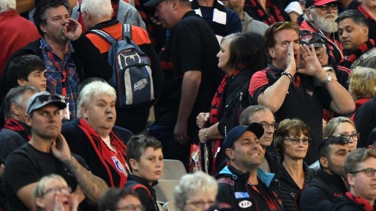 AFL BOMBERS MAGPIES BOOING