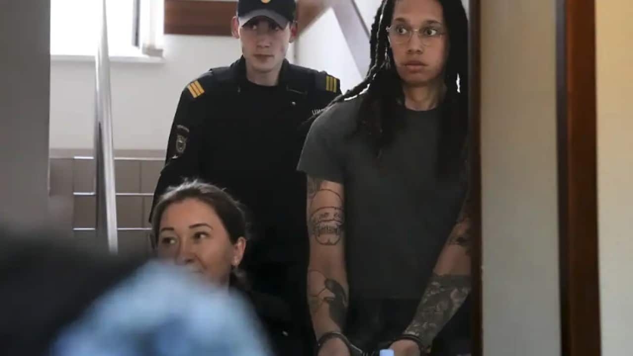 WNBA star and two-time Olympic gold medalist Brittney Griner is escorted to a courtroom for a hearing, in Khimki just outside Moscow, Russia, Monday, 27 June, 2022.