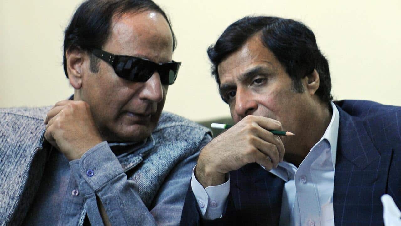 Chaudhry Shujjat Hussain (L), President