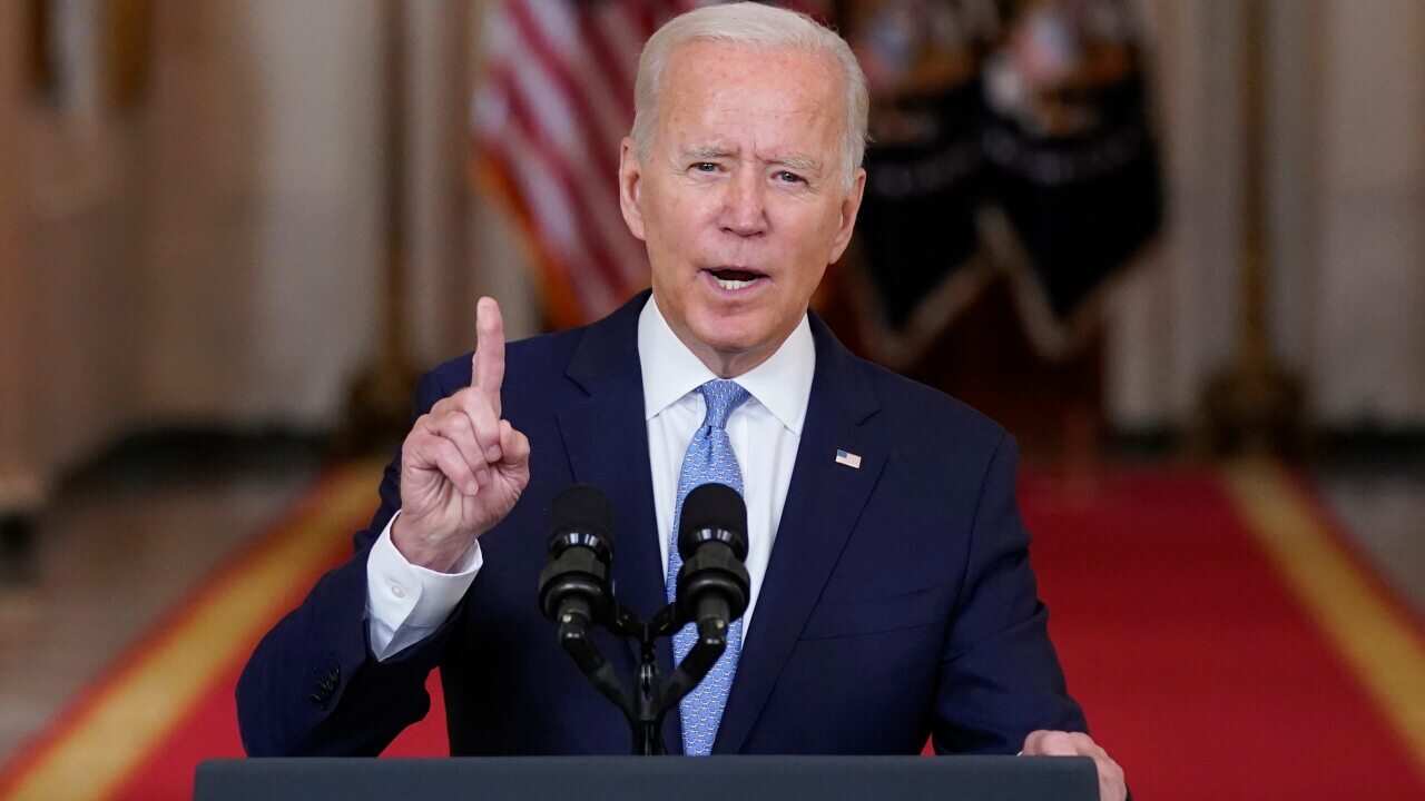 US President Joe Biden speaks from the State Dining Room of the White House