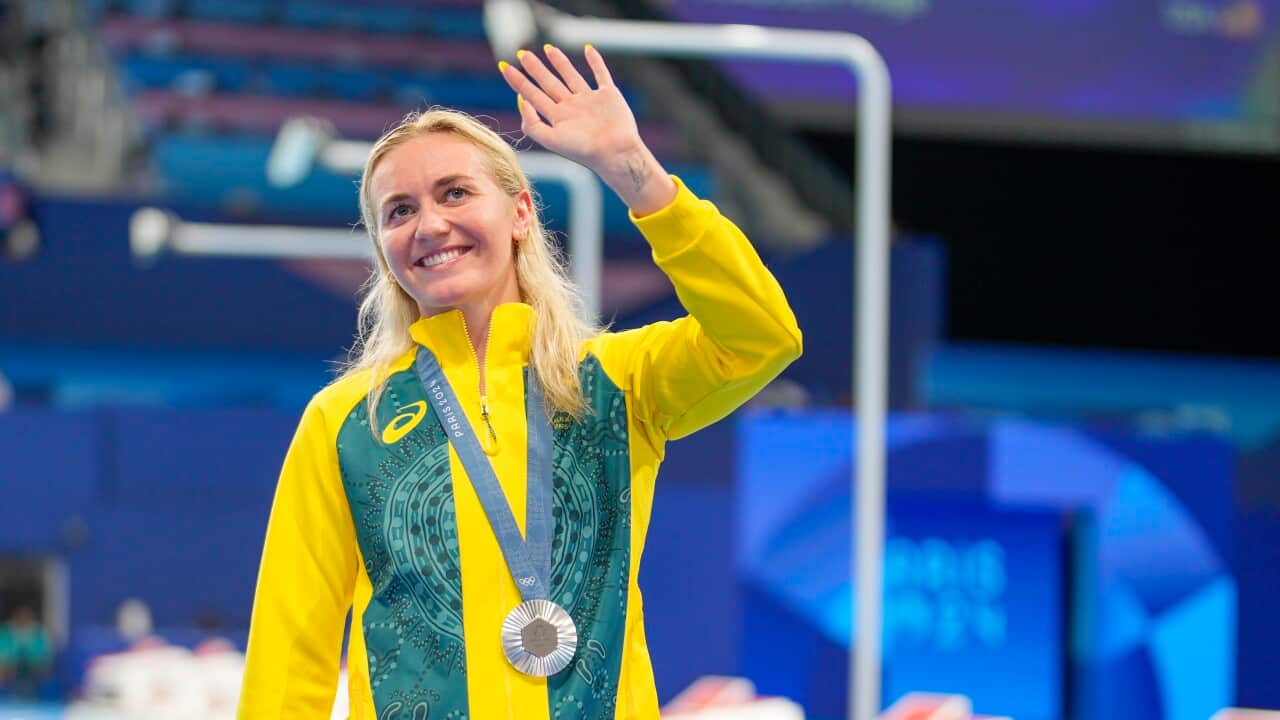 Ariarne Titmus of Australia show her Silver Medal during the Women's 800m Medals Ceremony on day eight of the Olympic Games Paris 2024 at Paris La Defense Arena
