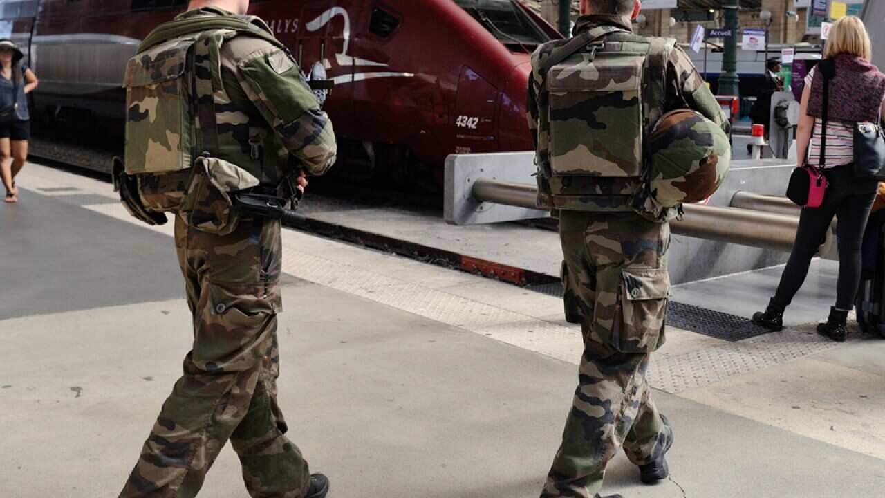 French soldiers patrol at Gare du Nord train station in Paris