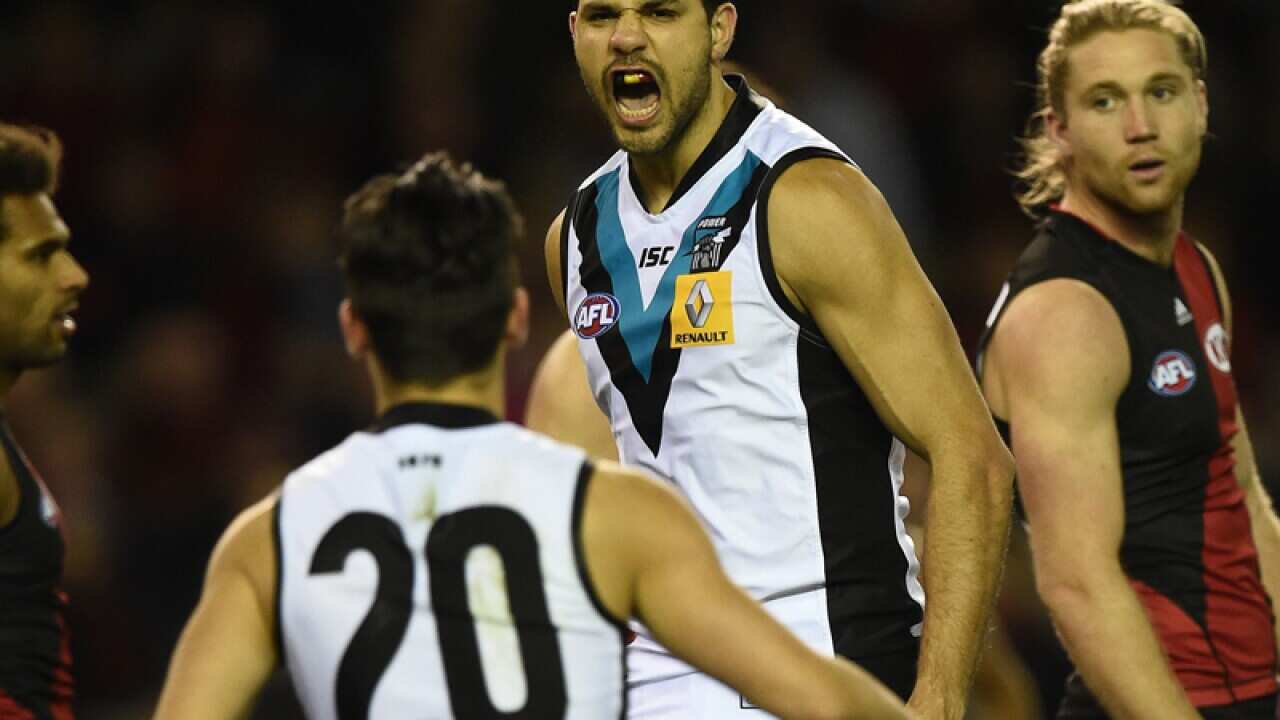 Power player Patrick Ryder reacts after a goal against the Essendon