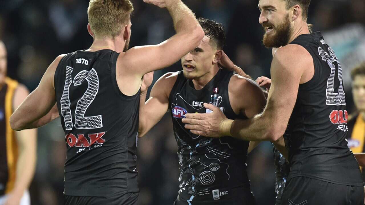 Port players Sam Powell-Pepper, Charlie Dixon and Jackson Trengove