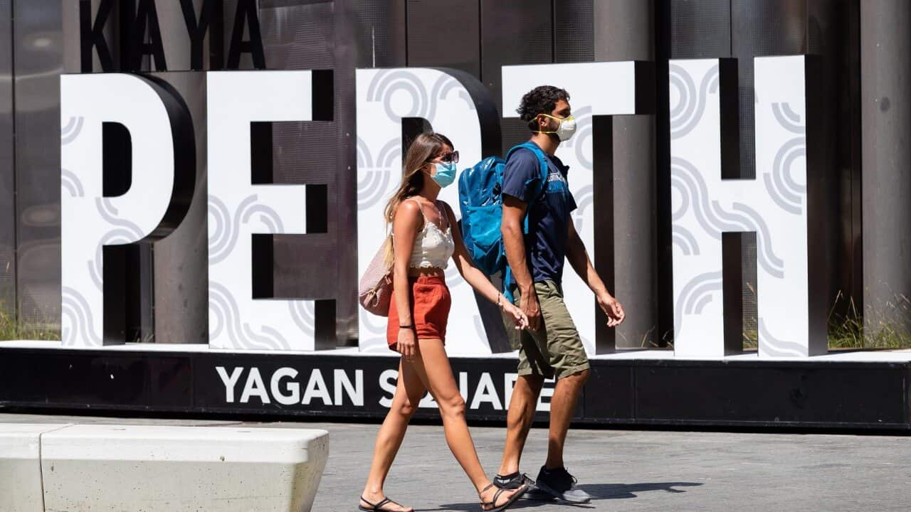 Members of the public are seen wearing masks in Yagan Square, Perth.