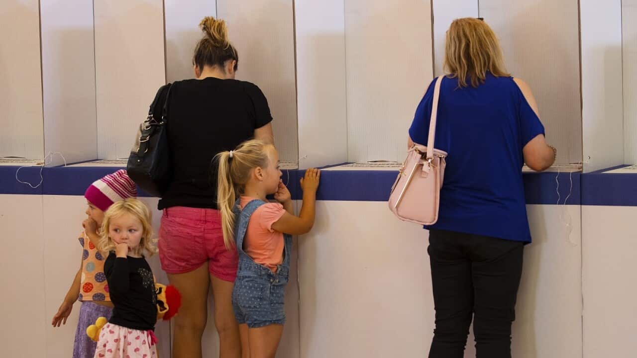 Voters cast their ballots in the Tasmanian State Election at Sorell Memorial Hall, Saturday, March 3, 2018. (AAP Image/Rob Blakers) NO ARCHIVING