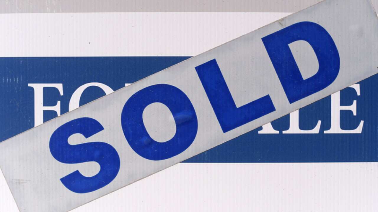 A sold sign outside a house