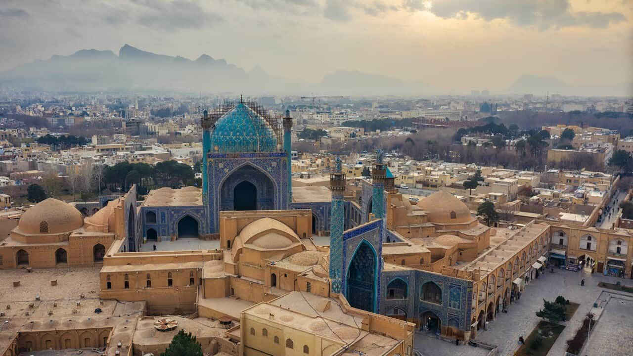 Blue buildings and hazy skies in the Iranian city of Isfahan.