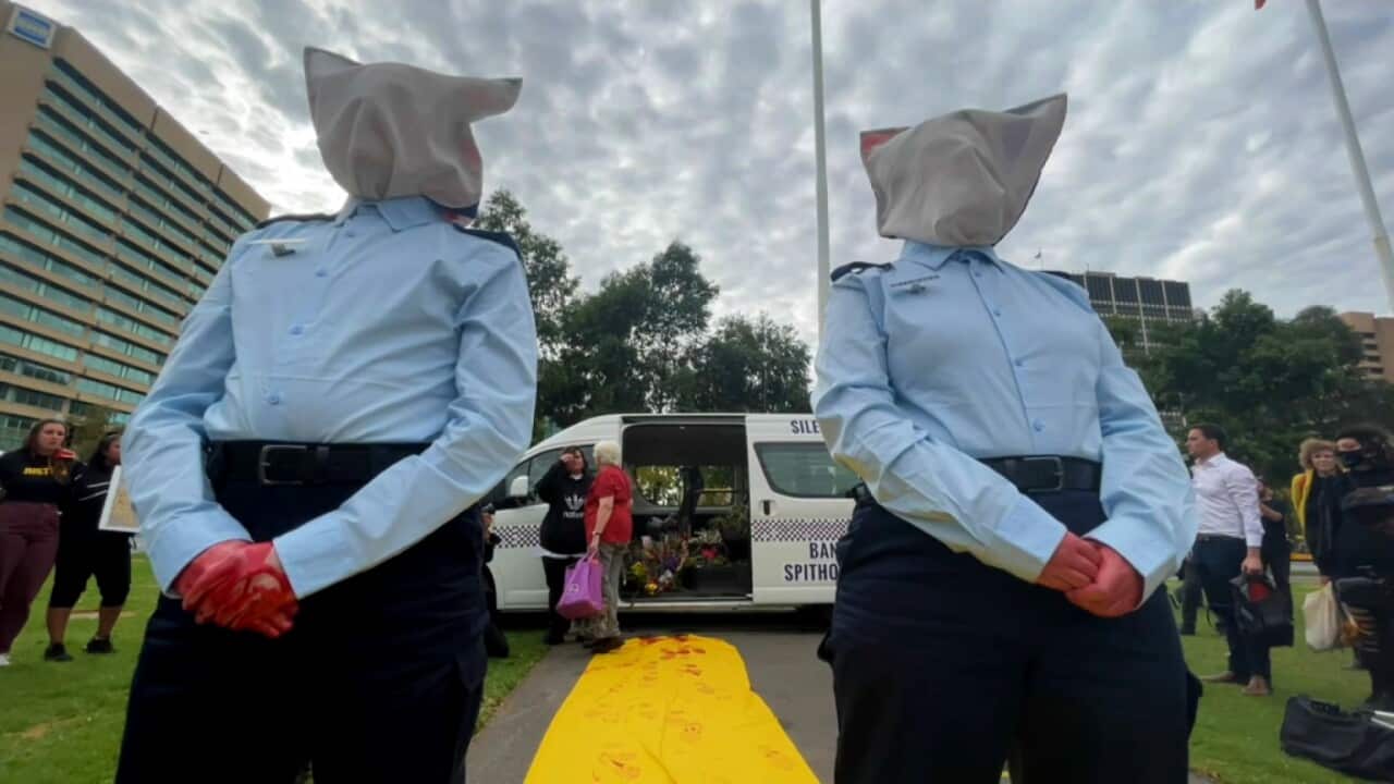 An anti-spit hood protest