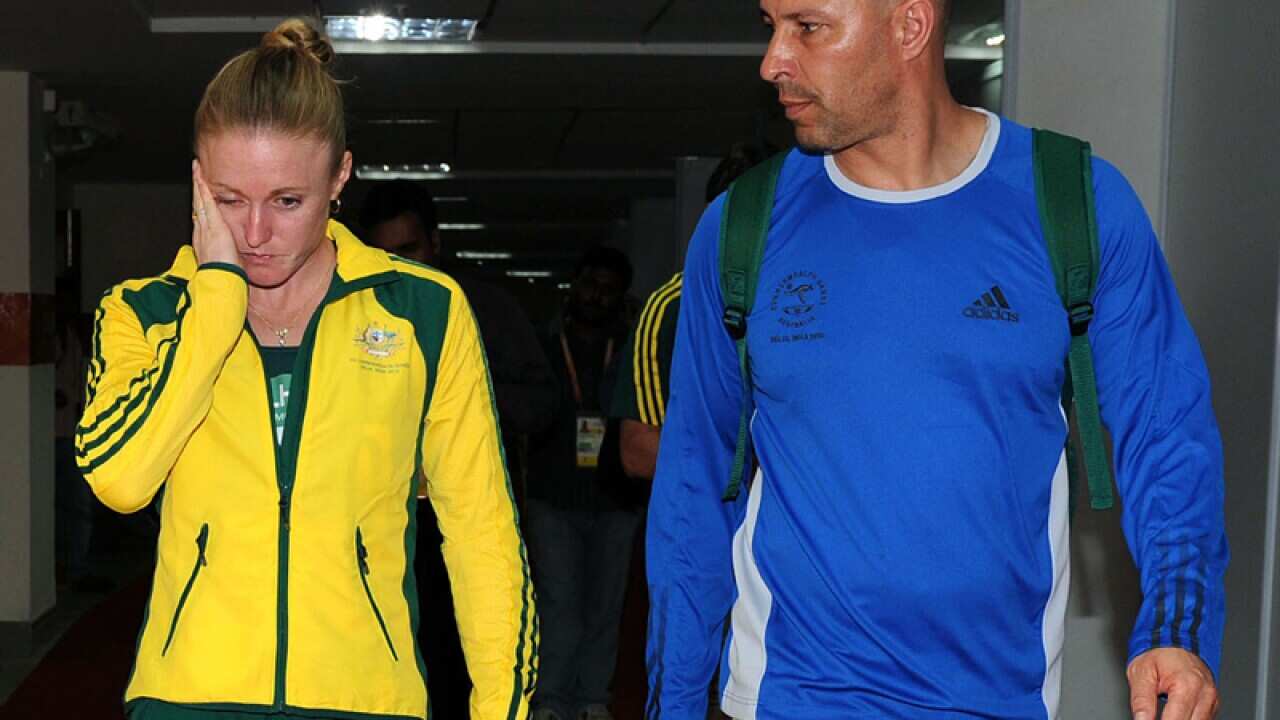 Sprinter Sally Pearson (L) and coach Eric Hollingsworth
