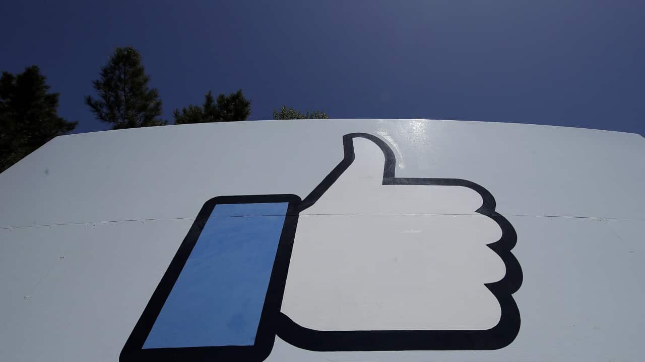 FILE, April 25, 2019, file photo shows the thumbs-up Like logo on a sign at Facebook headquarters in Menlo Park, California
