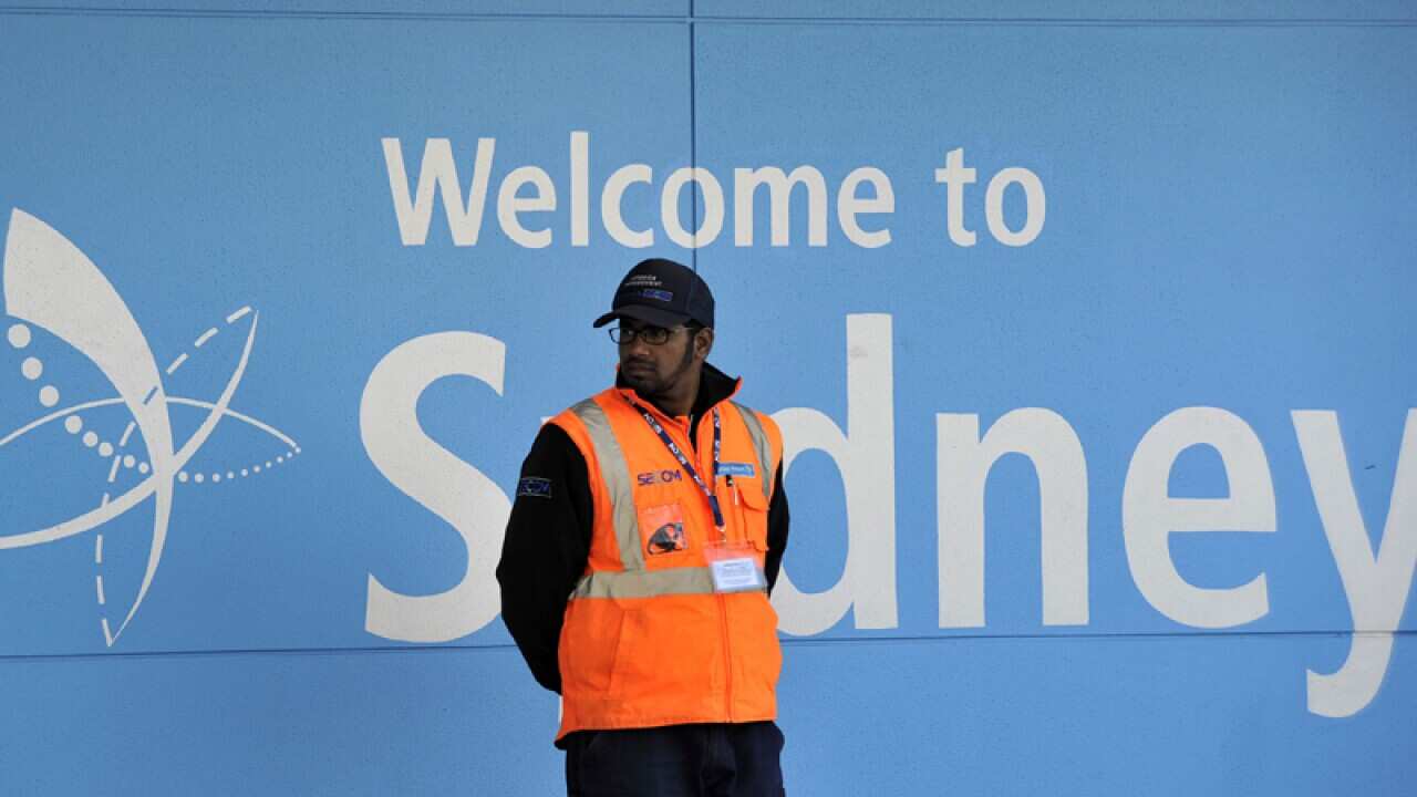 An airport worker at the Sydney International Airport