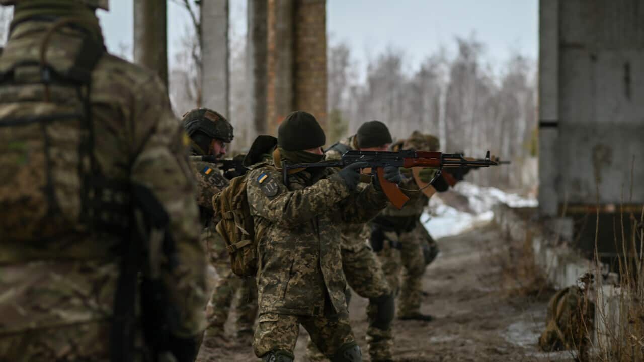 Ukrainian civilians and reservists conduct military training under the Ukrainian Territorial Defense Forces as Russian troops mass on the nation's borders.