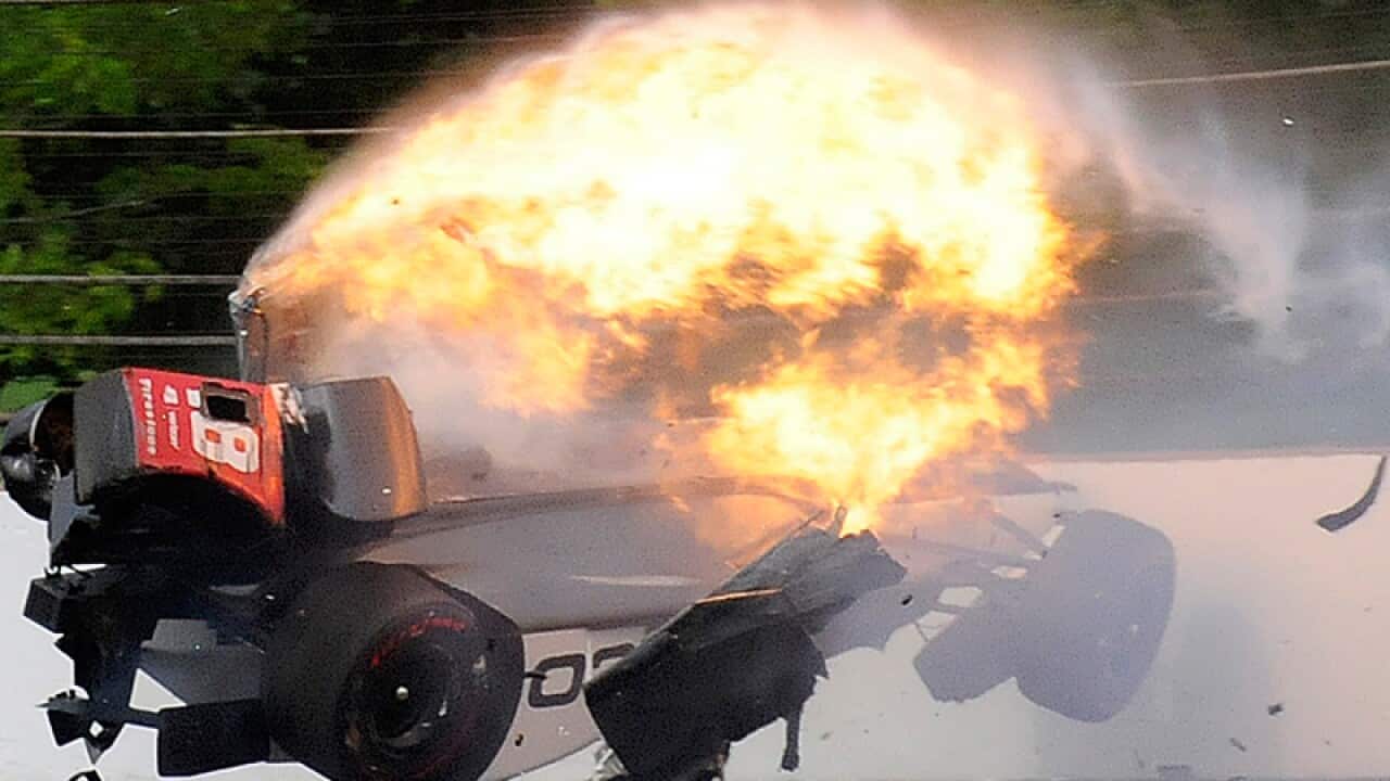 The car driven by Sebastien Bourdais impacts the wall at Indianapolis