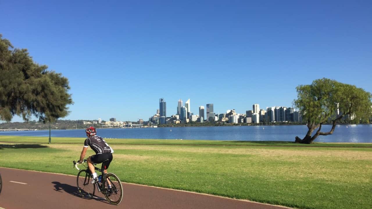 Cycling along Swam River in Perth