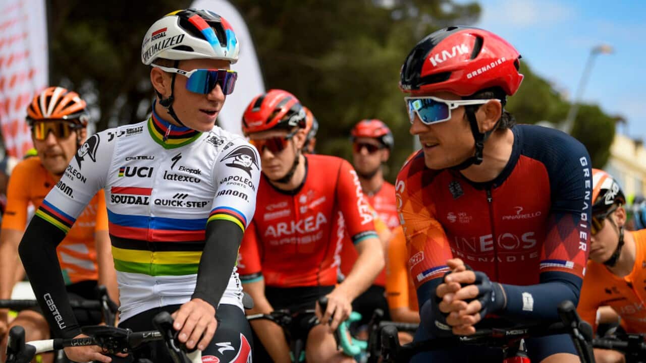 Soudal Quick-Step Remco Evenepoel speaks with Geraint Thomas of INEOS Grenadiers before a stage at the Giro d'Italia