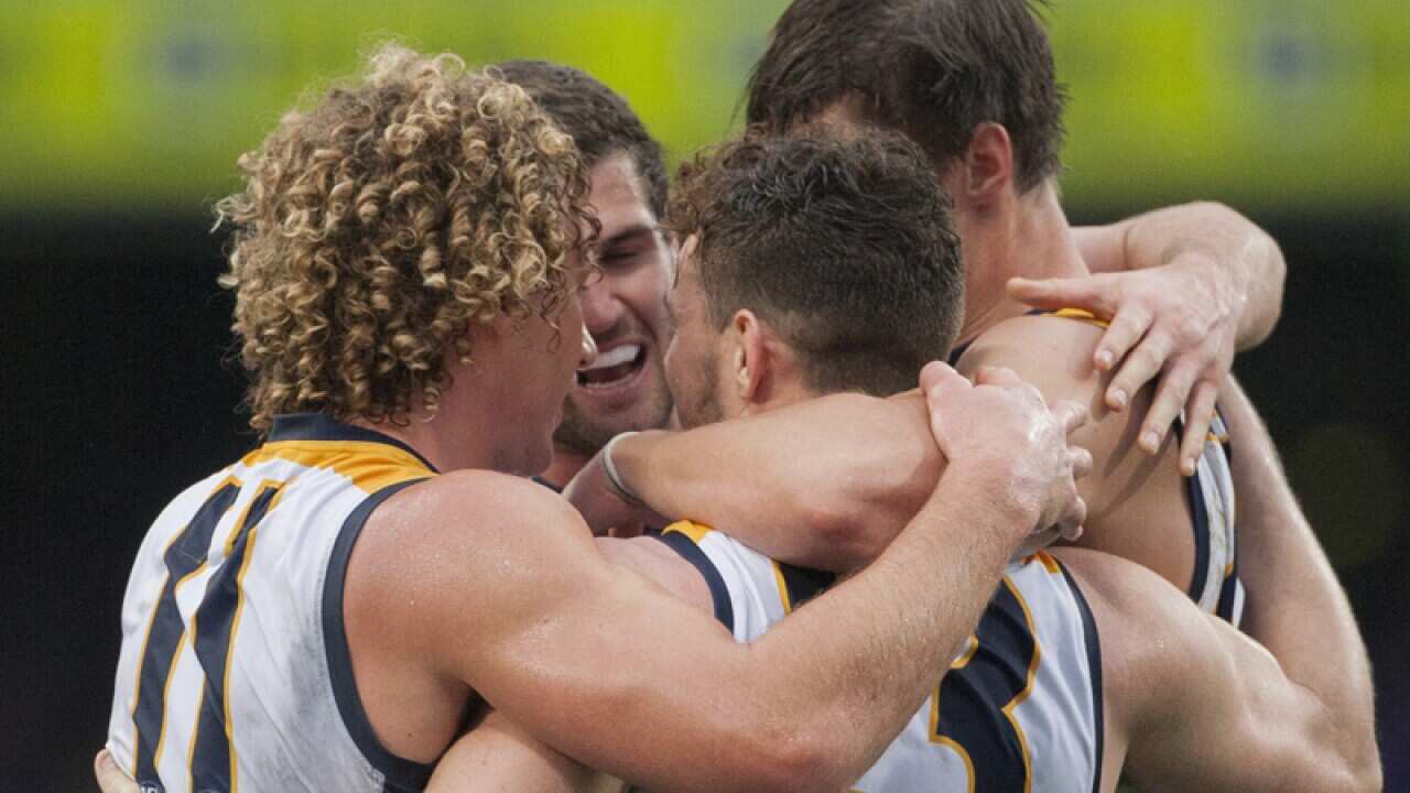 The West Coast Eagles celebrate their win