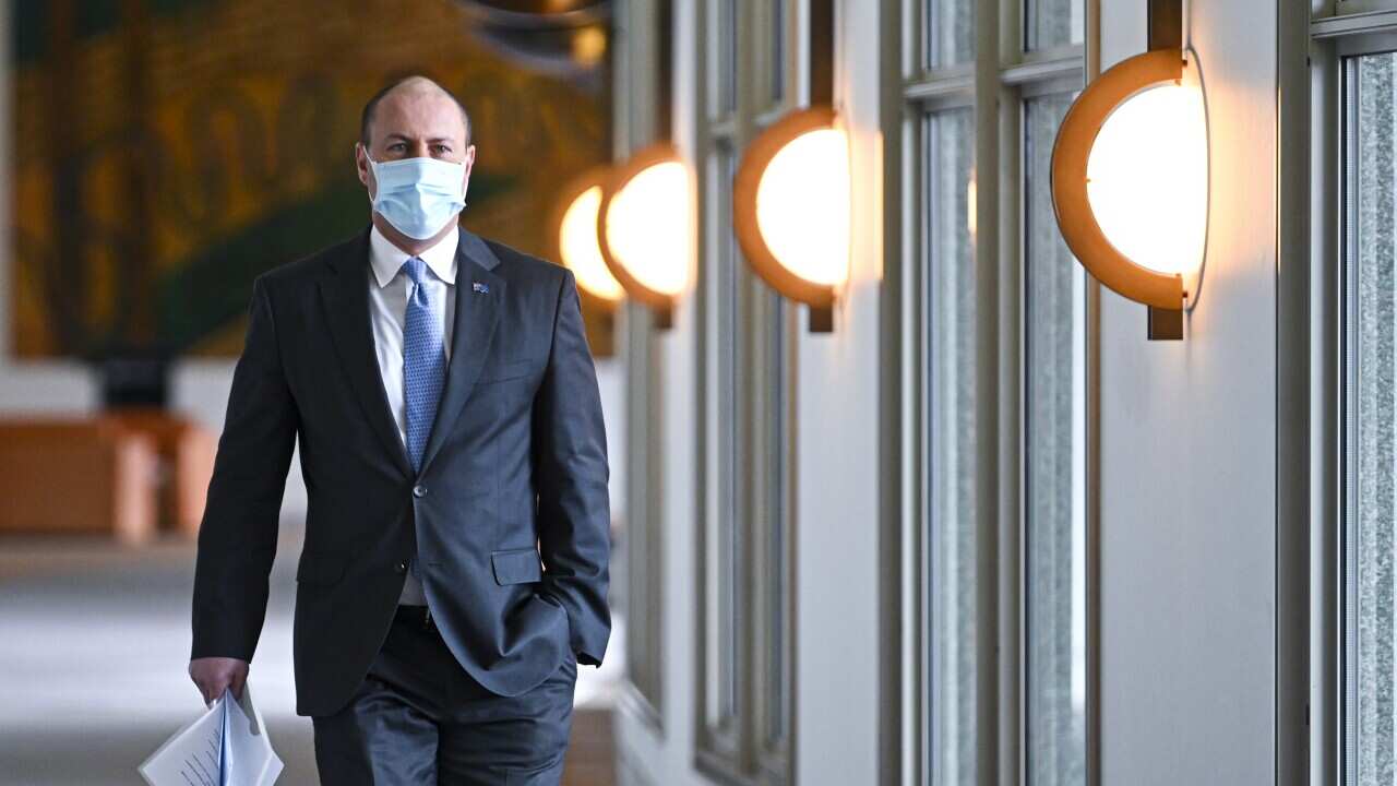 Australian Treasurer Josh Frydenberg arrives to deliver a fiscal strategy speech at Parliament House in Canberra, Thursday, September 24, 2020. (AAP Image/Lukas Coch) NO ARCHIVING