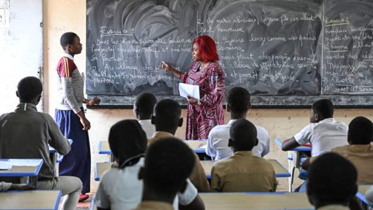 Students are seen at the Djedji Amondji Pierre high school in Adjame, Abidjan, on September 16, 2022.jpg