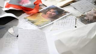 Cards, photos, and artworks are among the items to be preserved from the tribute site outside the Bondi Pavilion. 