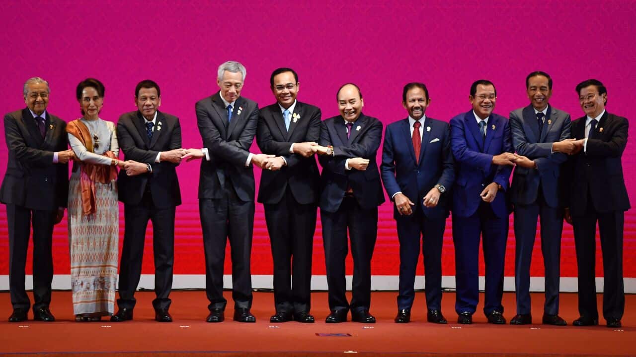 ASEAN leaders shake hands during the opening ceremony of the 35th Association of Southeast Asian Nations (ASEAN) Summit in Bangkok.