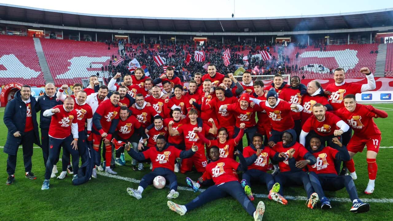 Red Star Belgrade players and coaching staff celebrate winning the clubs 36th Serbian championship