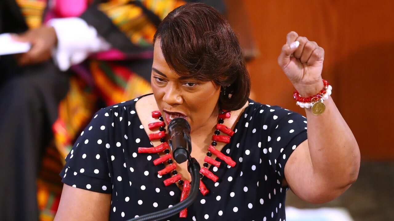 Bernice King makes a fist saying 'no justice no peace' while speaking at Rayshard Brooks funeral.