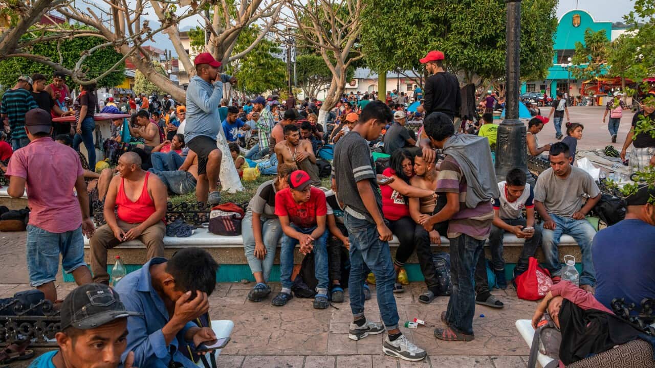 Members of a migrant caravan rest in the town plaza of Escuintla, Chiapas, Mexico.