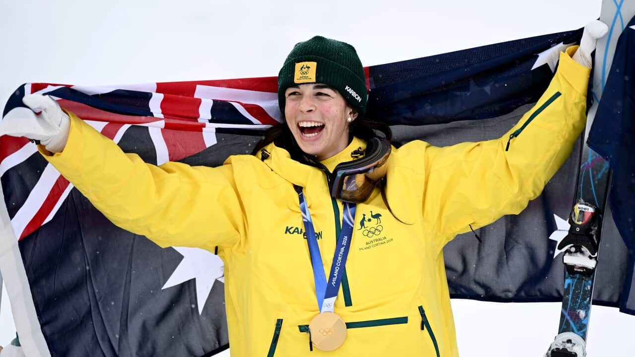 Jakara Anthony of Australia celebrates after being presented the Gold medal during the victory ceremony for the Women’s Dual Moguls Final at the Livigno Aerial and Moguls Park on day 8 of the 2026 Milano Cortina Winter Olympic Games in Livigno, Italy, Wednesday, February 11, 2026