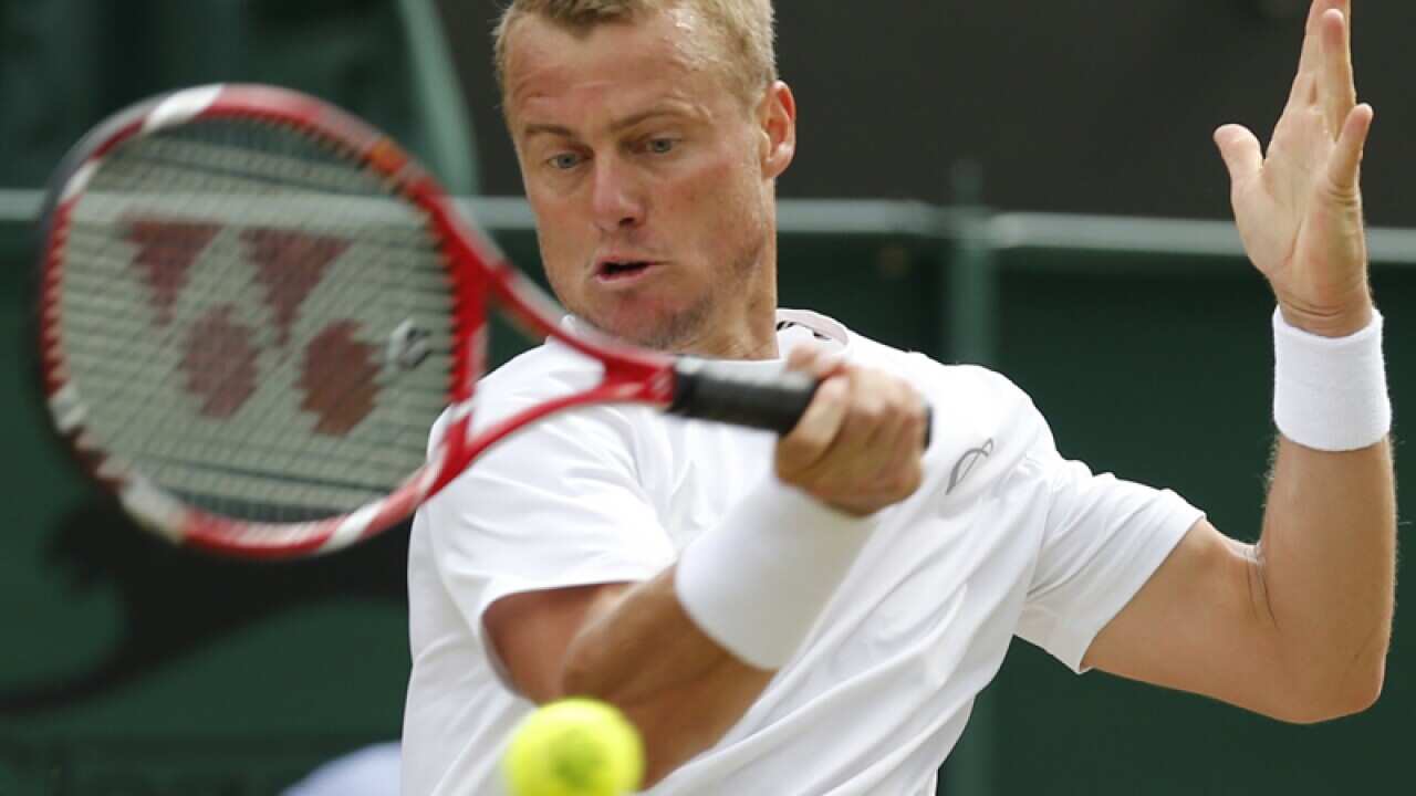 Lleyton Hewitt plays during Wimbledon.