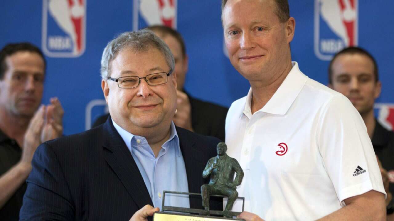 Atlanta Hawks CEO Steven Koonin (L) and head coach Mike Budenholzer