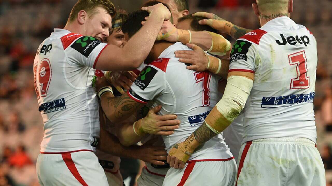 Dragons players congratulate Benji Marshall