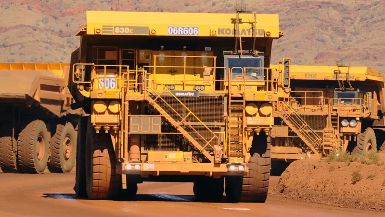 Haulage trucks at a Rio Tinto mine in the Pilbara