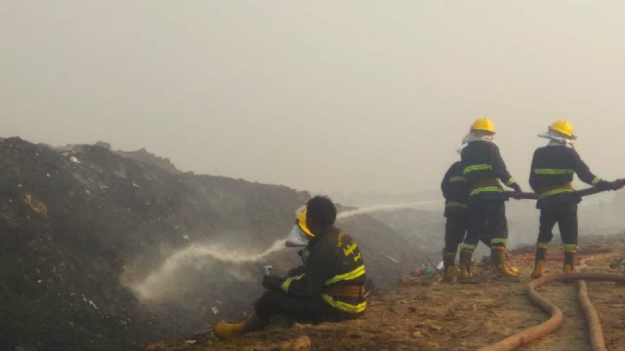 A fire at a dumpsite in Hlaing Tharyar township