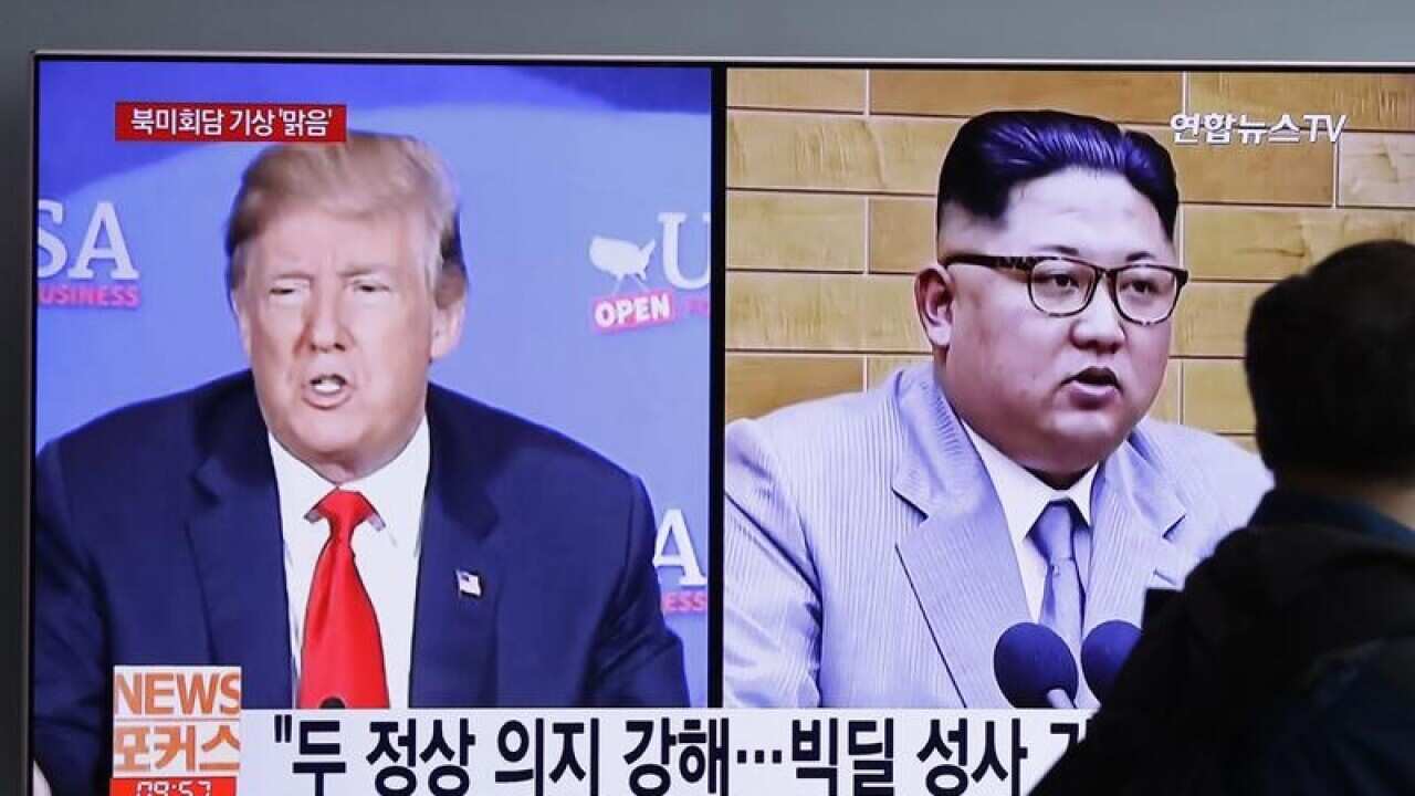 Kim Jong Un (right) orders Nuclear Test site demolition