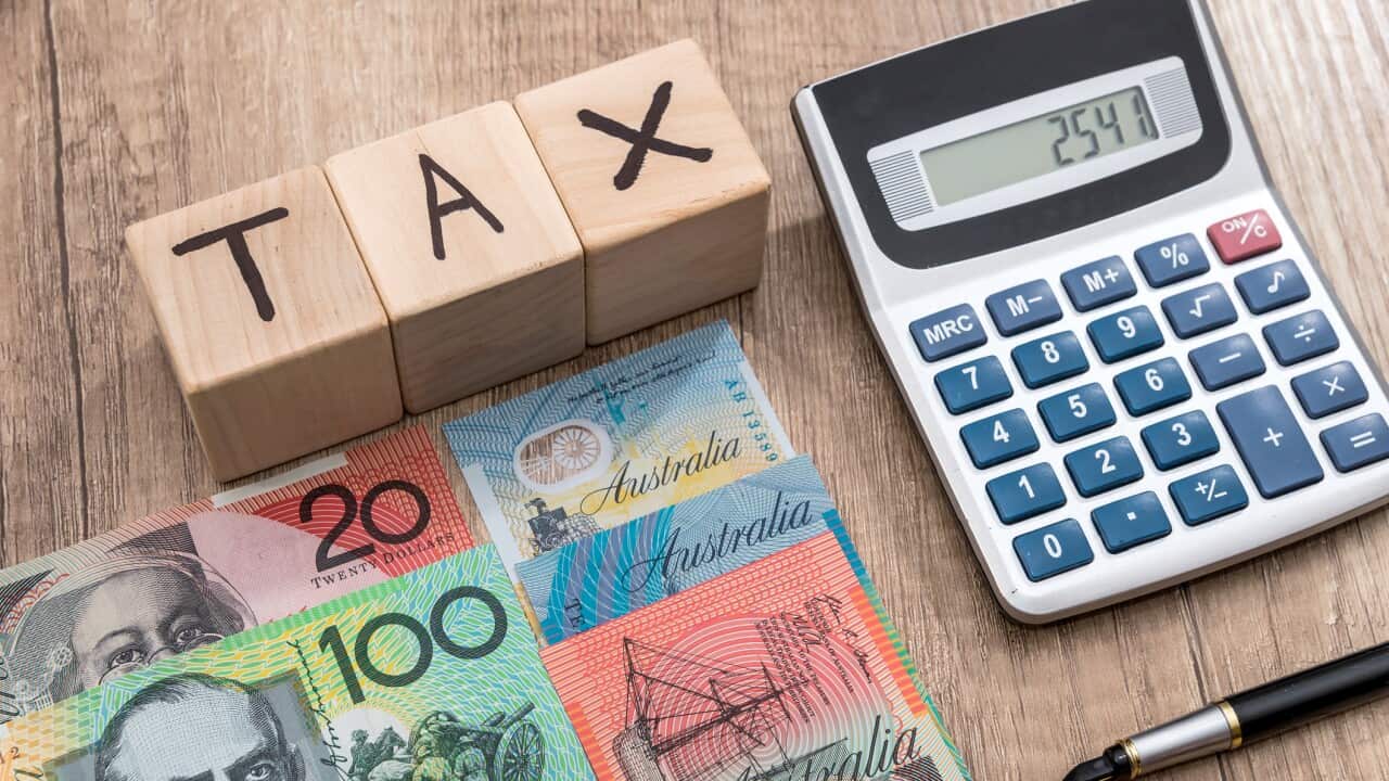 Wooden cubes with text tax australian dollar