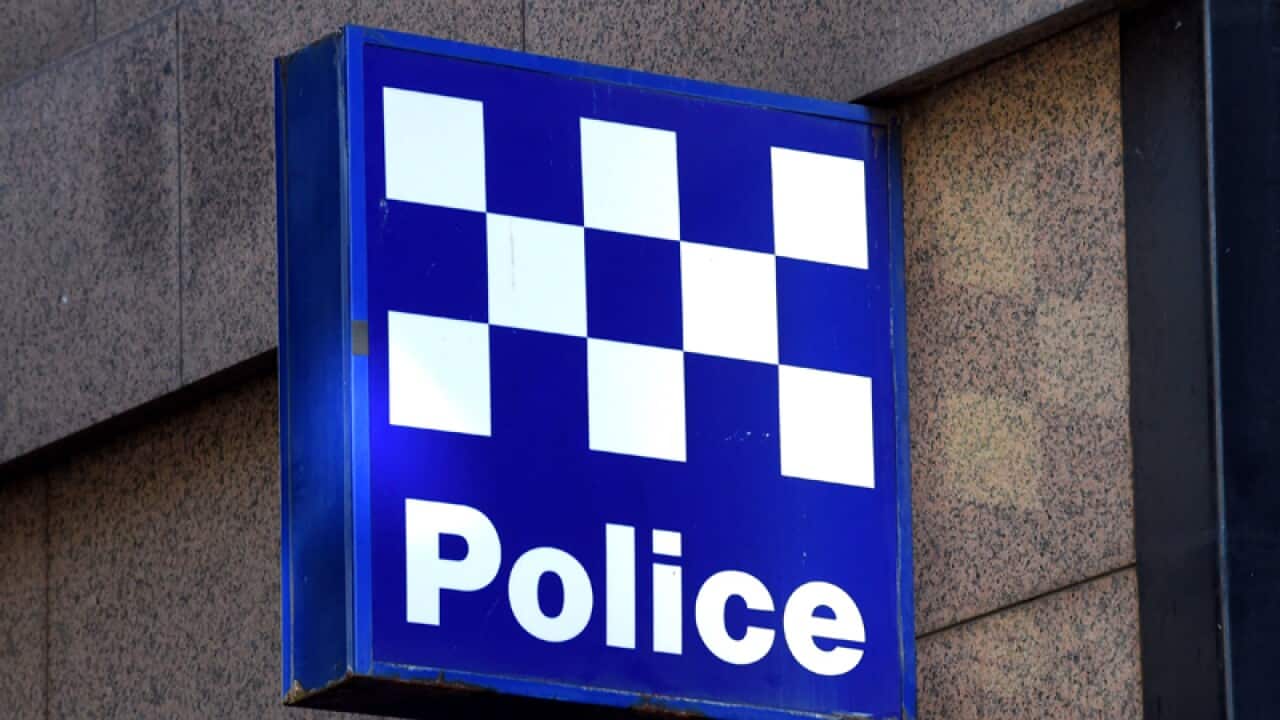 A police station sign