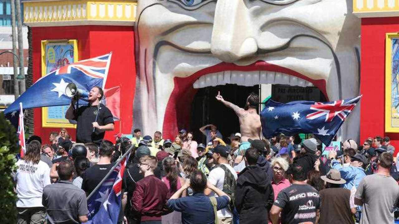 Far-right activists protest in front of Luna park in St Kilda on Saturday, January 5 2019.