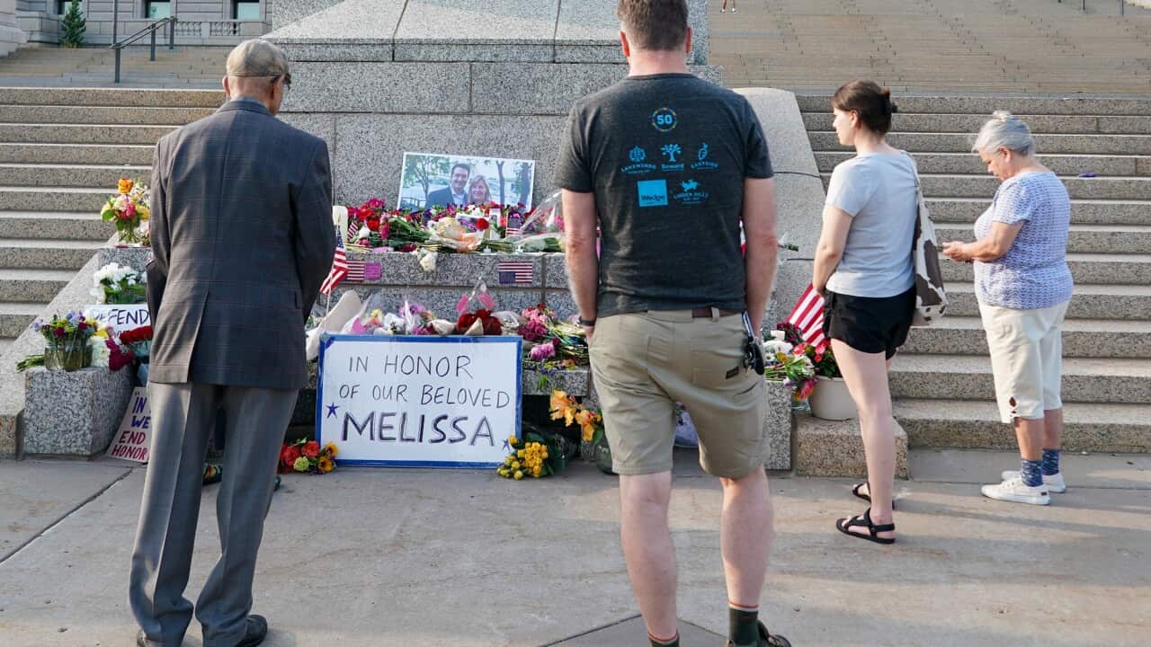 Flowers and notes laid at the steps of the Minnesota state legislature building