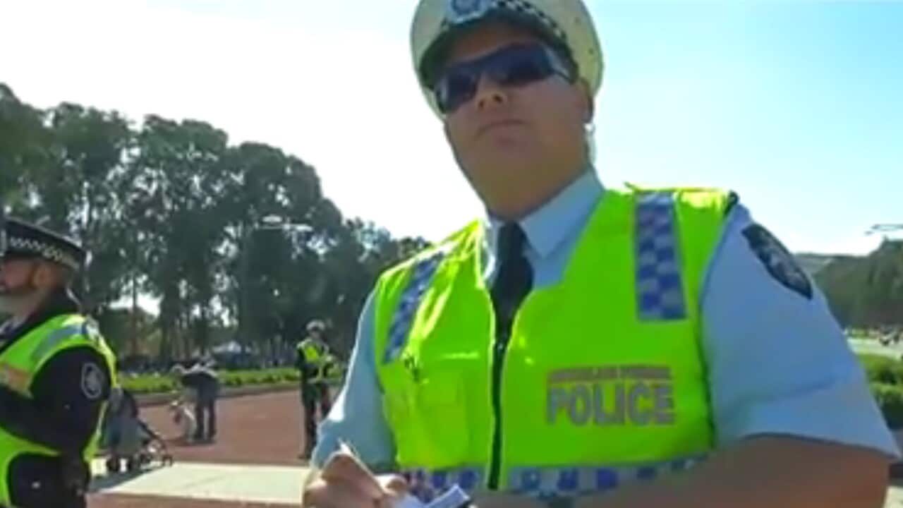Video footage of a heated exchange between police officers and NITV journalist Myles Morgan after an Anzac Day protest in Canberra has gone viral. (Facebook/NITV))