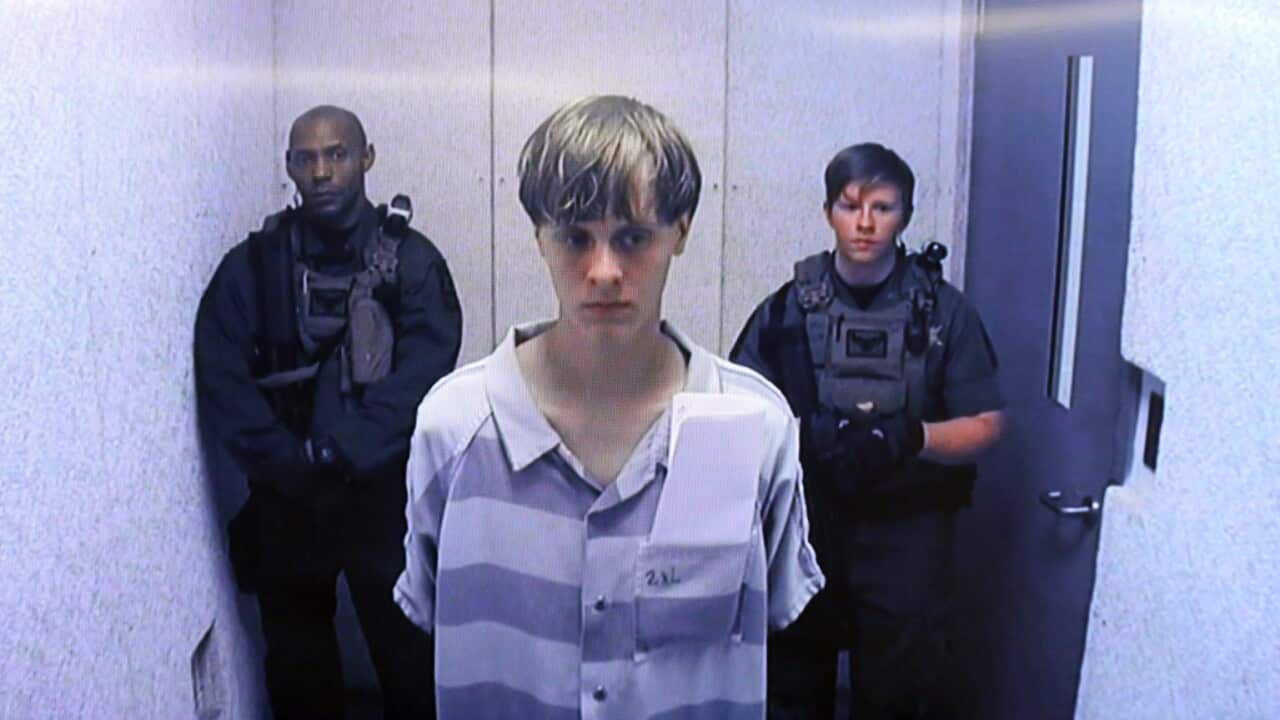 A file picture dated 19 June 2015 shows suspect Dylann Roof (C) appearing via video link at a bond hearing in court in North Charleston, South Carolina, USA. 