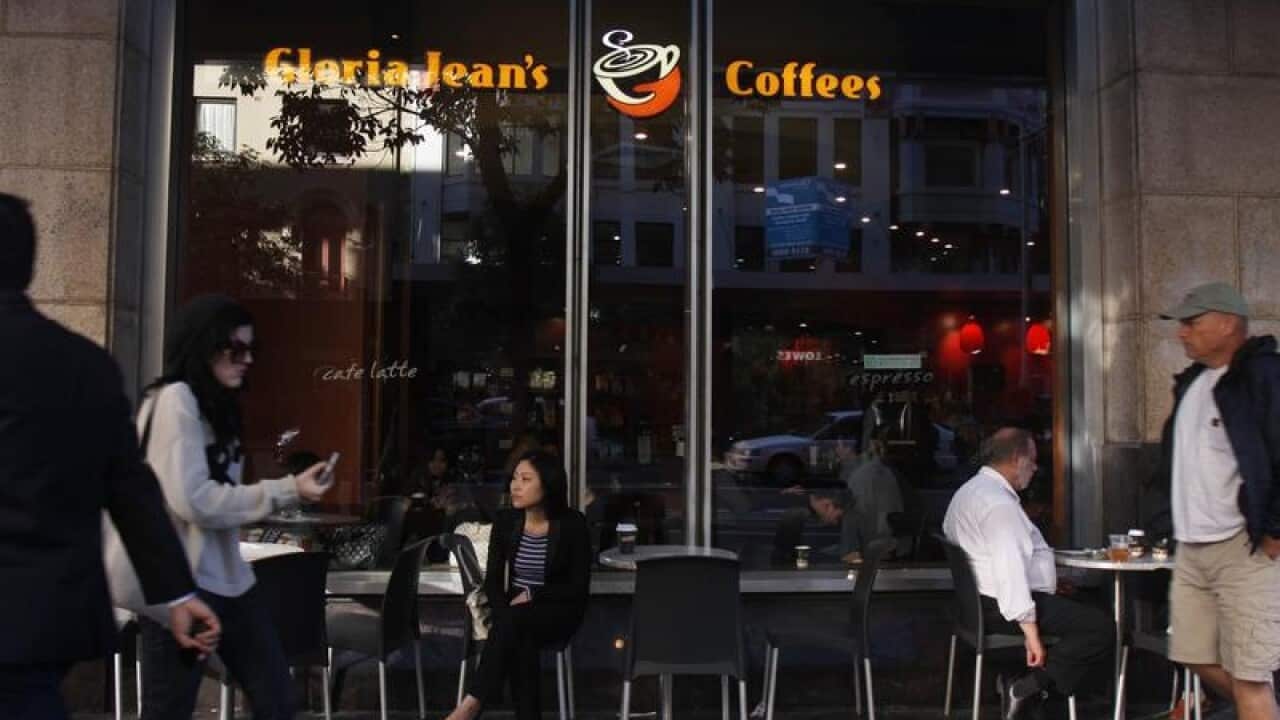 Customers at a Gloria Jean's Coffees shop