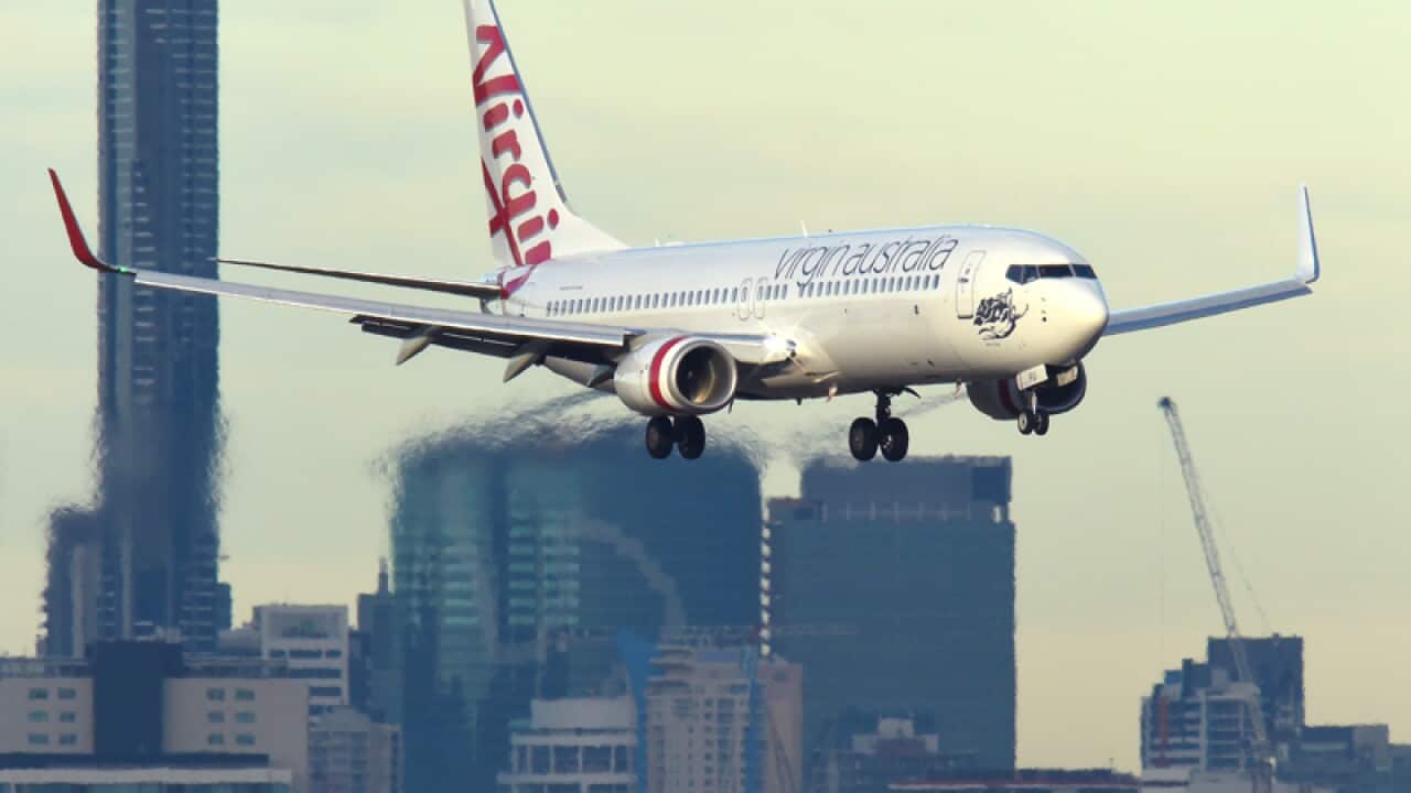 A Virgin Australia plane is seen on approach into Brisbane airport