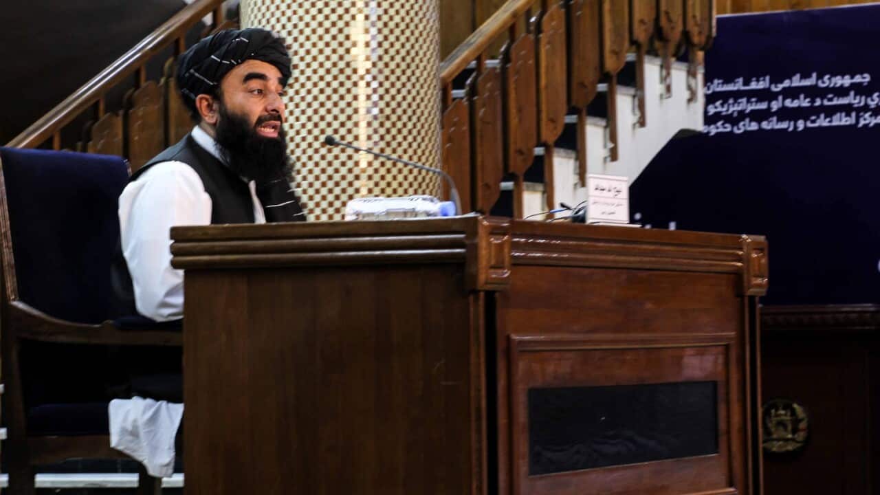 Taliban spokesman Zabhiullah Mujahid announces the interim government