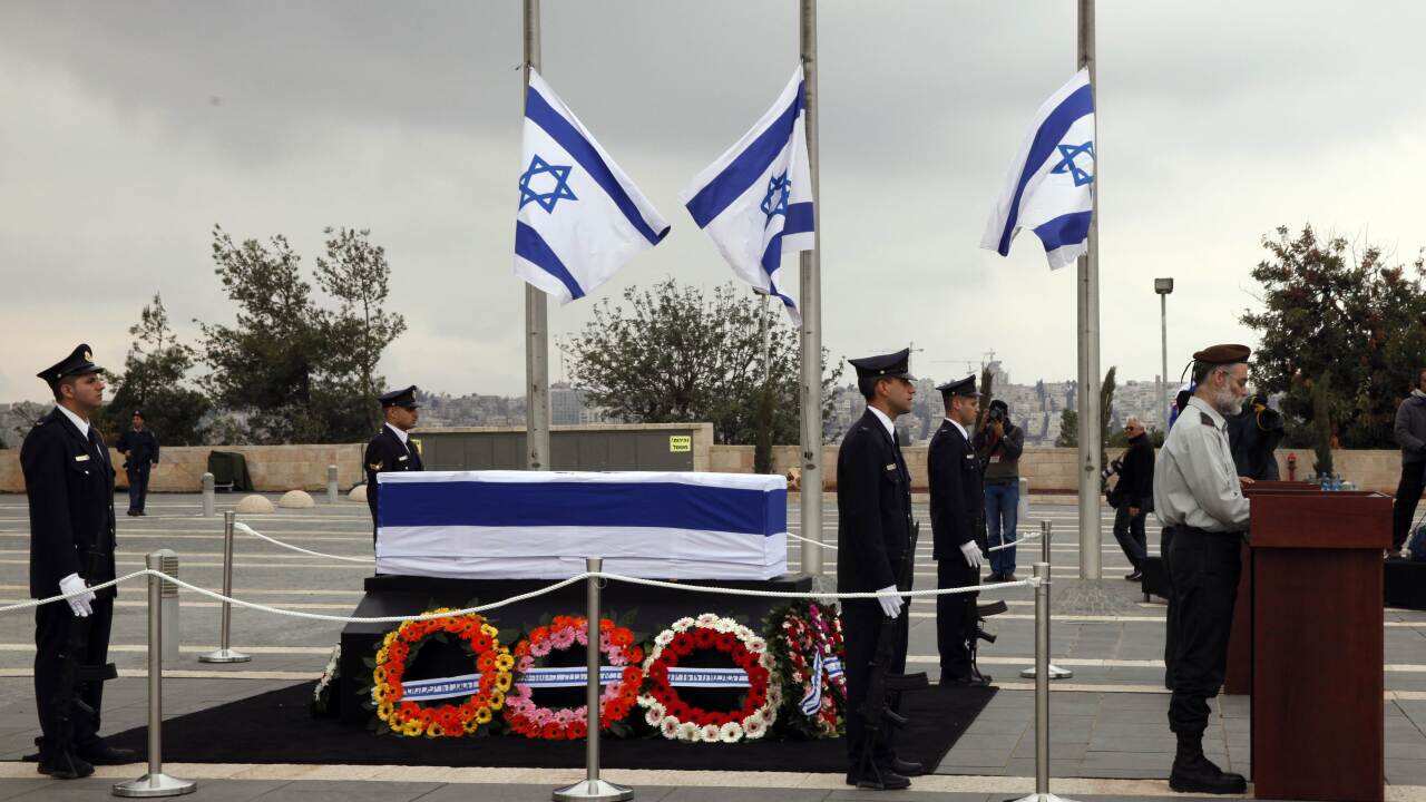 An Israeli honor guard stands next to the coffin of former prime minister Ariel Sharon - AAP.jpg