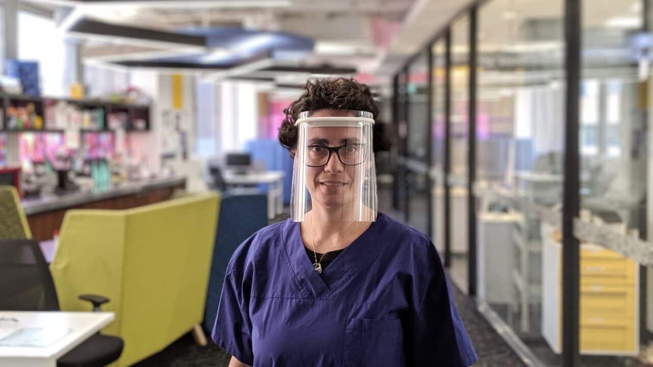 Orthopaedic Surgeon Claudia Di Bella wearing a facial shield made by a 3D printer.