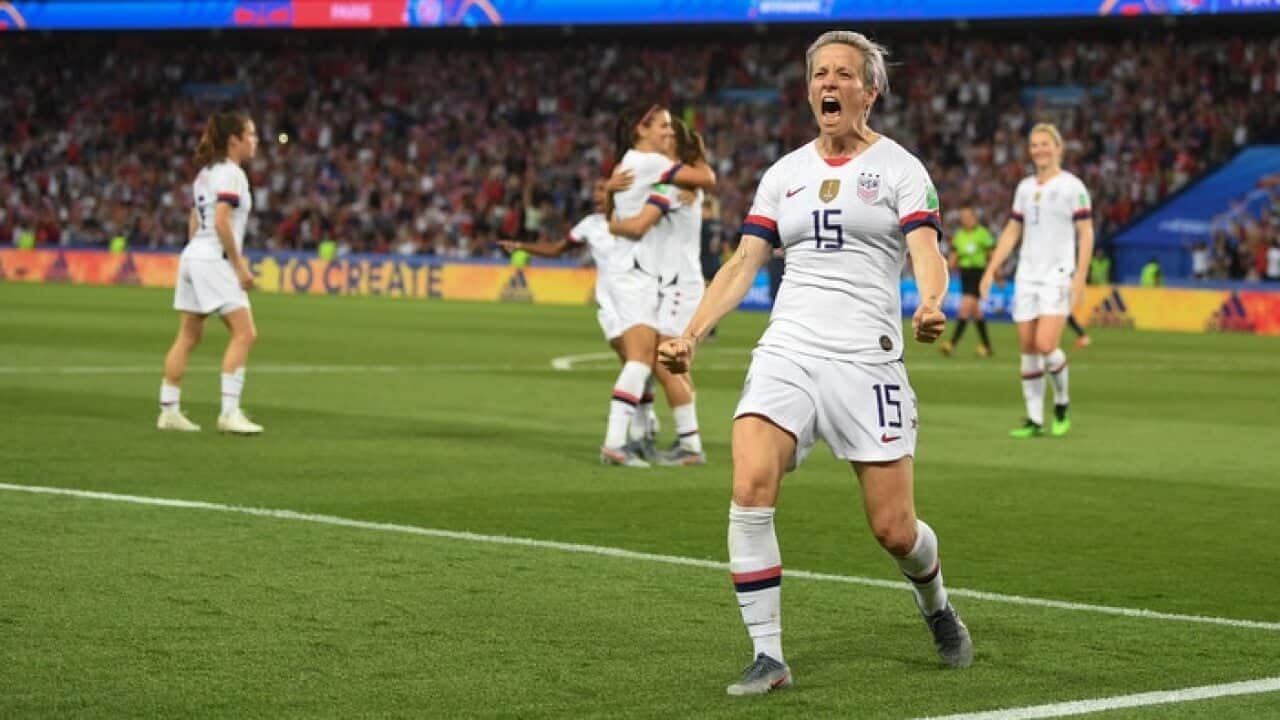 Megan Rapinoe of the USA celebrates scoring during the France quarter-final match