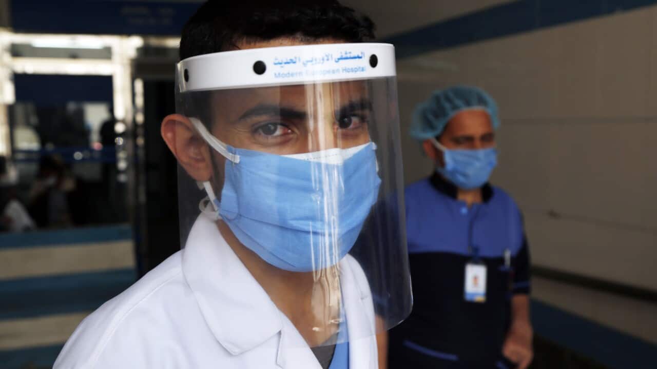 An unidentified health worker at a COVID-19 ward in Sanaa, Yemen, last year. 